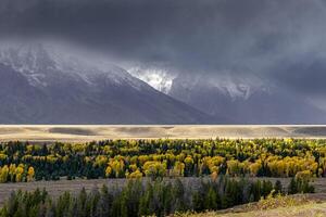 Stormy weather over the Grand Teton mountain range photo