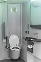 toilet interior in commuter train car photo