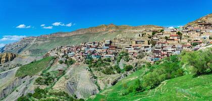 ancient mountain village Chokh over rocky valley in Dagestan photo