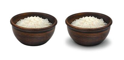 boiled white rice in clay bowl on white background, isolated and with shadow photo