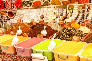 colorful spices and fruit teas at a local bazaar in Kemer, Turkey photo