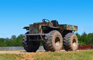 homemade swamp buggy on a village street photo