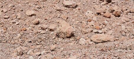 Desierto cama de un Derretido glaciar hecho de rojizo piedras, recordativo de un marciano paisaje foto