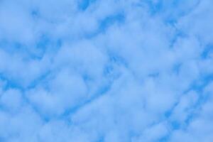 natural background - blue sky with light cumulus clouds photo