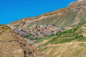 ancient mountain village Chokh on the edge of the canyon in Dagestan photo