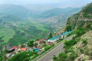 village next to the highway on a mountain pass, Gunib village in Dagestan photo