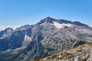 view of the top of Mount Fisht in the Caucasus from the slope of Mount Oshten photo