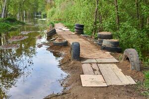 impromptu pavement made in the countryside during a spring river flood photo