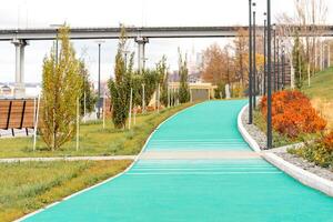 jogging track in the sports area of the city coastal park photo