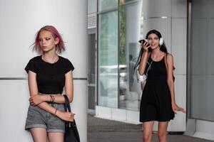 teenage girls on city street photo