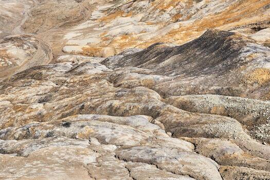 ravine in a clay land devoid of soil soil at an open pit mining site photo