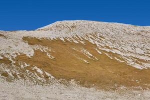 dry mountain tundra on the slopes of Mount Oshten, Caucasus, Russia photo