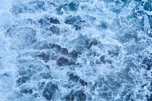 background, texture - stormy sea waters in foam photo