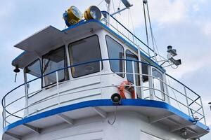 wheelhouse of a small river tug photo