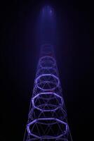 lattice TV tower hiding in the night fog photo