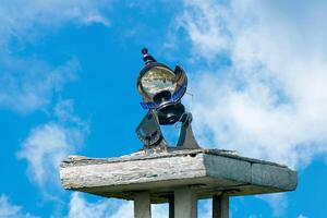 spherical meteorological sunshine recorder heliograph at the weather station against the sky photo