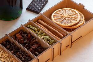 set of spices for mulled wine in a wooden box photo