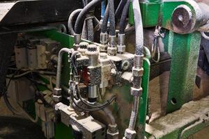 machinery and electrical equipment of the sawmill, covered with a layer of sawdust photo