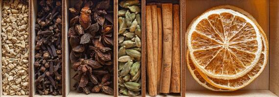 set of spices for mulled wine in a wooden box photo