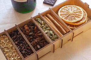 set of spices for mulled wine in a wooden box photo
