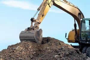 buclet of excavator at construction works close up photo