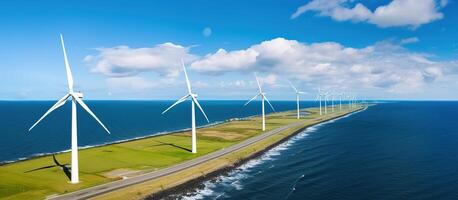 Aerial view of wind turbines on the coast of Baltic Sea. photo