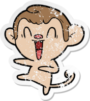 distressed sticker of a cartoon laughing monkey png