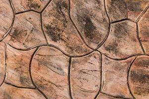 Brown rock texture in top view serves as a unique and captivating.  Nature from top of hill. photo