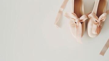 AI generated Ballet shoes with strips bow isolated on white graceful background with copy space, concept of hobbies and dancing and elegant lifestyle photo