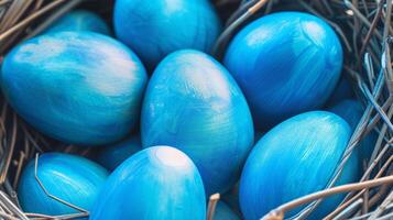 AI generated Blue painted Easter eggs are neatly arranged in a nest. Perfect for Easter-themed designs and decorations photo