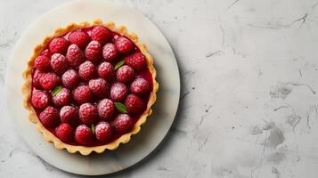 AI generated A close - up shot of Raspberry Rosewater Tart, light gray textured plaster background, top view photo