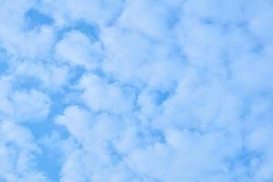 natural background - blue sky with light cumulus clouds photo