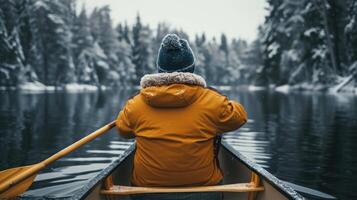 AI generated Male traveler in winter coat canoeing photo