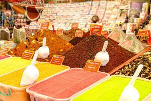 colorful spices and fruit teas at a local bazaar in Kemer, Turkey photo