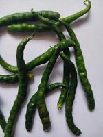 green chilies isolated on white background. Green chili with clipping path and full depth of field. Set or collection photo