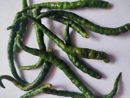 green chilies isolated on white background. Green chili with clipping path and full depth of field. Set or collection photo