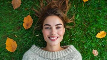 AI generated Relaxed woman laying down on green grass background. Top view of young woman enjoy her freedom with nature, Natural alternative therapy photo