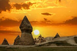 Beautiful landscape Cappadocia stone and Goreme national park Nevsehir Turkey. Amazing Sunset and incredible sky photo