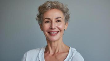 AI generated Head shot portrait happy beautiful retired woman. Mature female advertises professional services of dental clinic smile look at camera. Carefree life on retirement photo