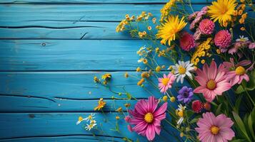 AI generated Garden flowers over blue wooden table background. Backdrop with copy space photo
