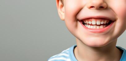 AI generated Close up of beautiful little boy smile with white teeth over plane background. Header image with empty space for text. photo