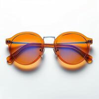 ai generado Gafas de sol con naranja vaso en elegante hierro marco aislado blanco para social medios de comunicación enviar Talla foto