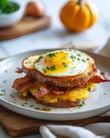 AI generated Gluten Free French Toast Sandwich with Bacon, Egg and Butternut Squash on white plate with background blur photo