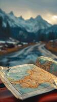 AI generated Road trip essentials Car, map, and open road ahead Vertical Mobile Wallpaper photo