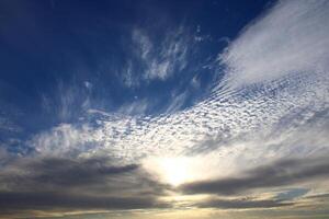 Cirrocumulus are formed by the deformation of Cirrus or Cirrostratus clouds or by the shrinkage of fragmented Altocumulus. photo