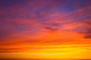 Clouds and different color tones in the sky at sunset. Dance of colors in the sky. Amazing and incredible sunset. photo