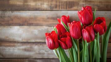 ai generado ramo de flores de rojo tulipanes en un de madera antecedentes. primavera flores de la madre día antecedentes. foto