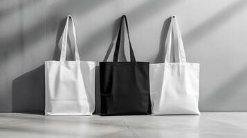 AI generated White and black tote bags on a grey background. photo