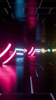 Multicolored neon balls roll across the shiny floor. Vertical looped animation video