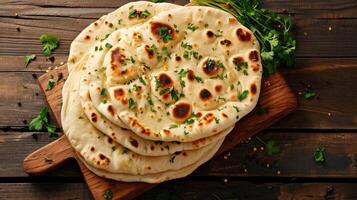 AI generated Indian naan bread on wooden table. photo